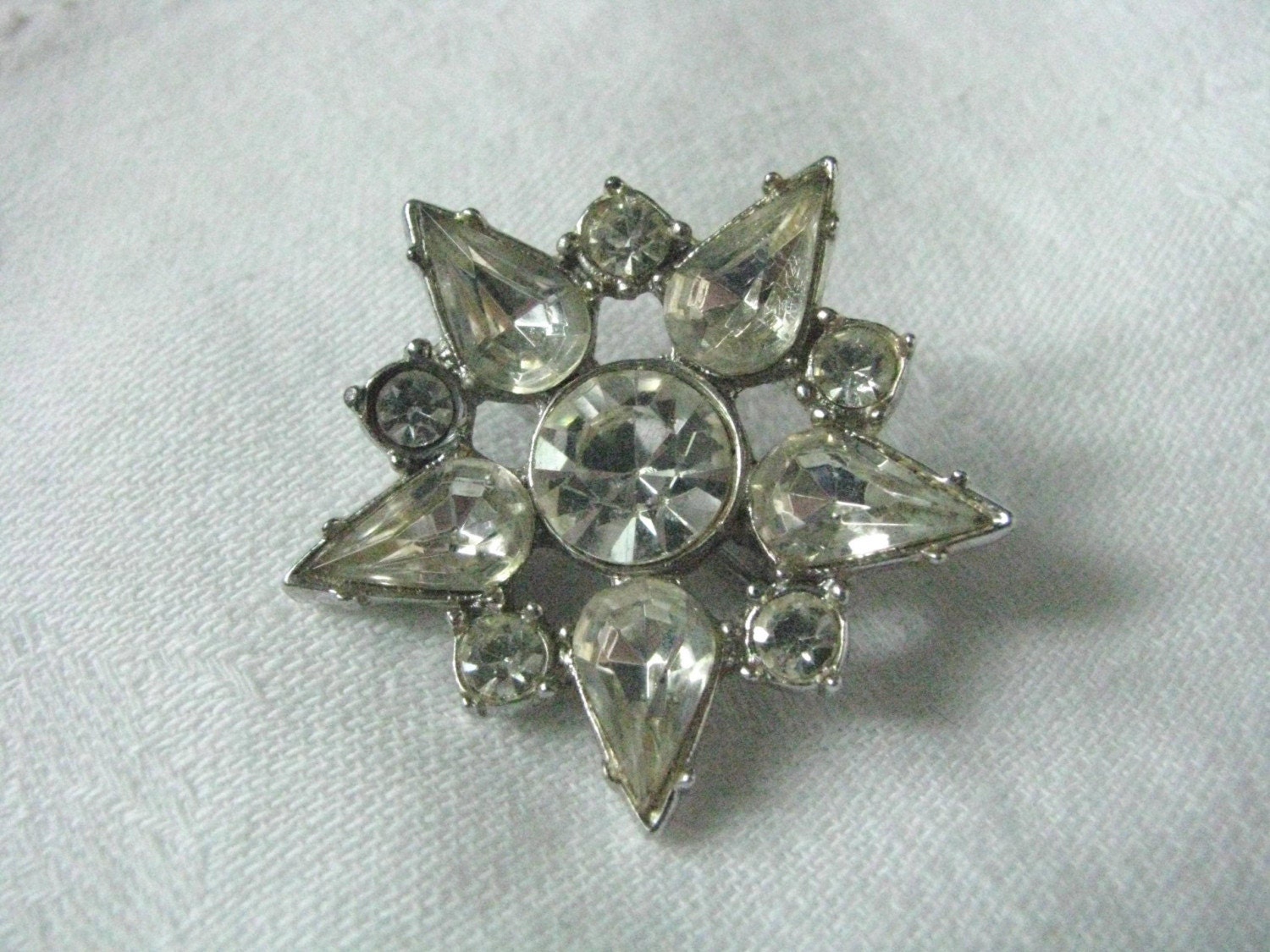 Silver tone star flower brooch pin with rhinestones Less than perfect
