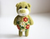Pocket green ornamented bear