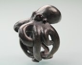 Octopus ring Sterling black silver red ruby eyes  sized  7 to 11  original design carved cast and finished in NYC