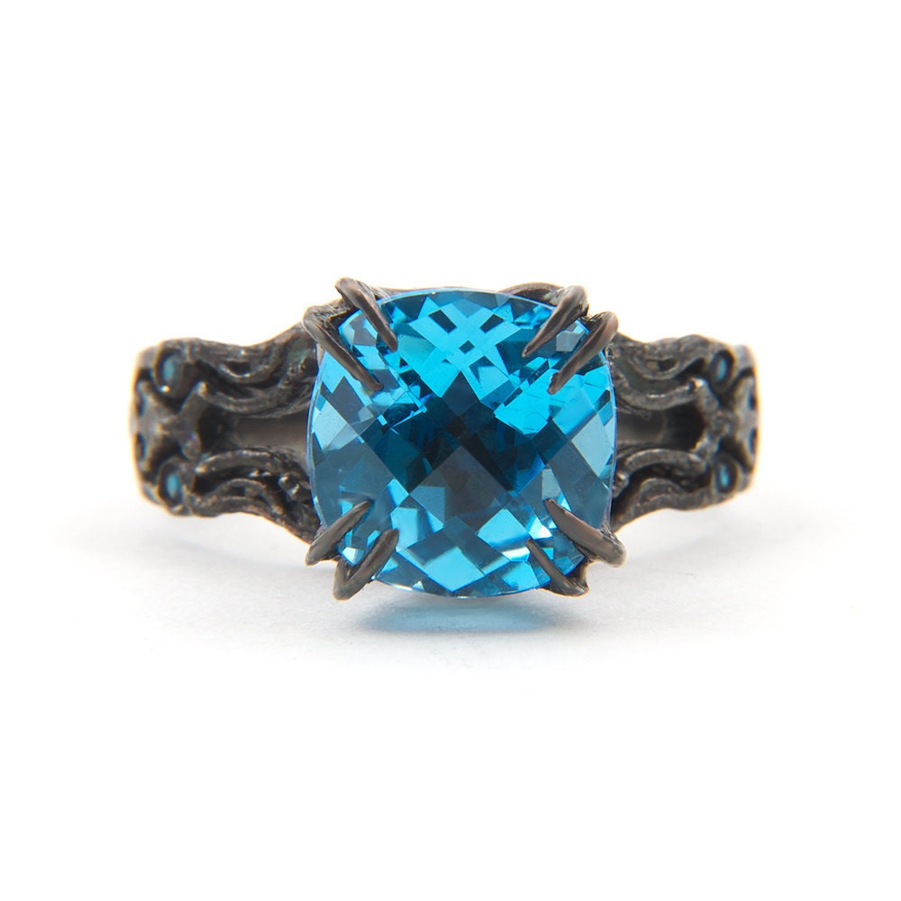 Kathula blue topaz and sapphire ring