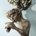 Pan Necklace in solid bronze made in NYC on an 18 inch chain