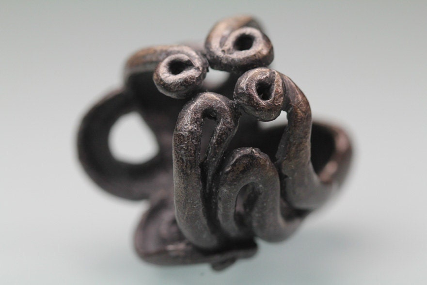 Octopus ring Sterling black silver red ruby eyes sized 7 to 11 original design carved cast and finished in NYC