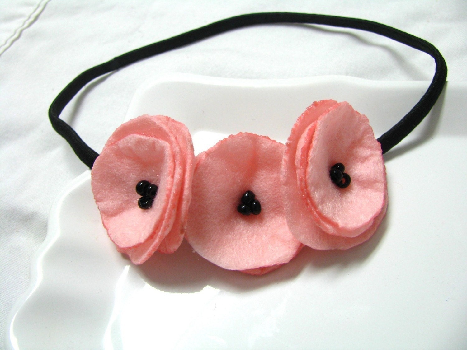 sweet love light pink felt poppy garland headband.