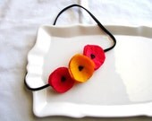 pomegranate orange sherbet pink and orange felt poppy garland headband.