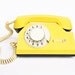 Vintage yellow rotary phone