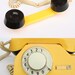 Vintage yellow rotary phone