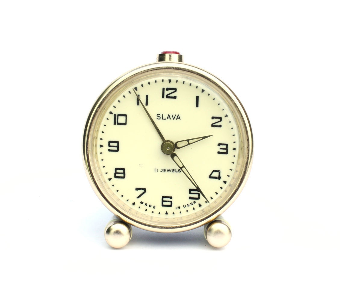 Vintage Russian mechanical alarm clock Slava from Soviet Union period