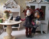 Anais, a 7,5 inch needle felted doll.