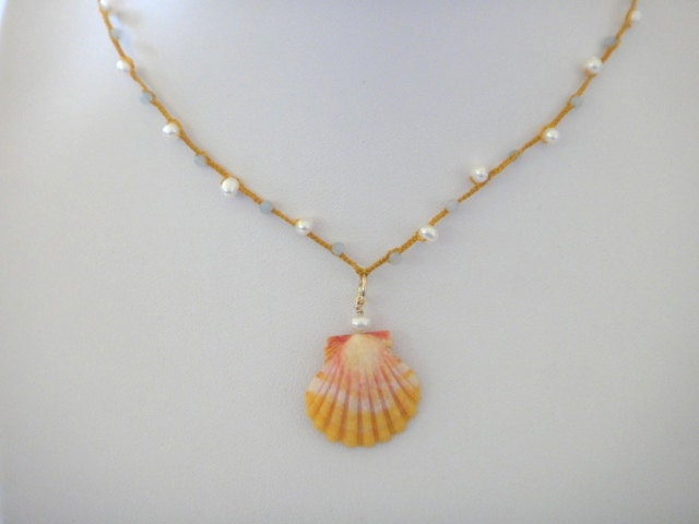 Sunrise Shell on Gold Braided Cord with Pearls and Apatite