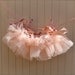 Newborn Tutu--Baby Ballerina Antique Pink . Teeny, tiny and can be hung in the nursery. Clothes pins and ribbon included.