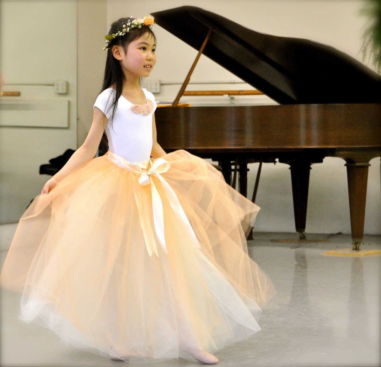 Little Girls pink or white lined leotard to match all our tutus. No blossoms.