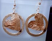 Heart dangle earrings in copper and silver