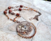 necklace with hessonite garnet and smoky quartz in copper