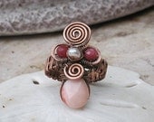 pink opal ring in copper with rubies and pearl
