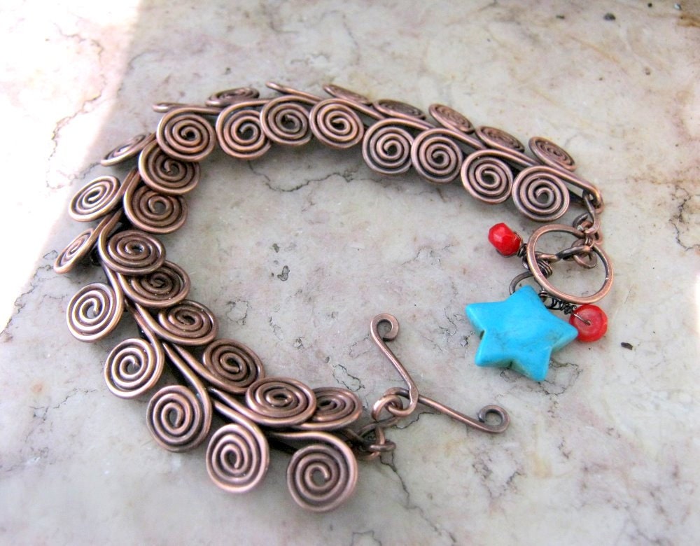 egyptian coil bracelet in copper with turquoise and coral