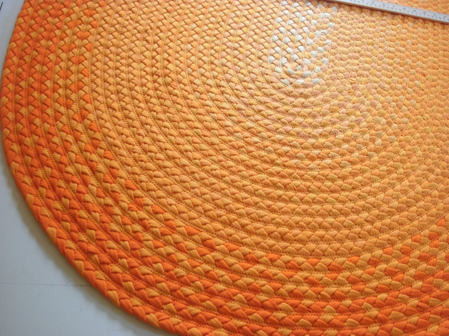 Ready to ship 48"x 66" soft orange rug braided from organic cotton and recycled t shirts