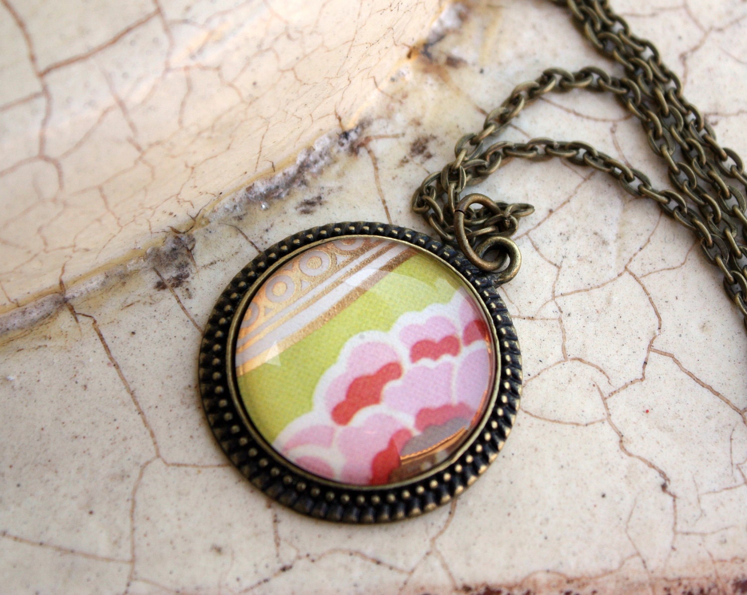 Glass pendant necklace -- Gold & green with a pink flower