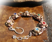 Bullet Bracelet with Luger 9mm Casings Coiled into Rosettes with Colored Swarovski Crystals, Sterling Silver