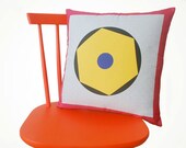 Geometric cushion with hexagon in yellow