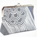 Denim kiss lock purse with mid-century styled screenprint pattern