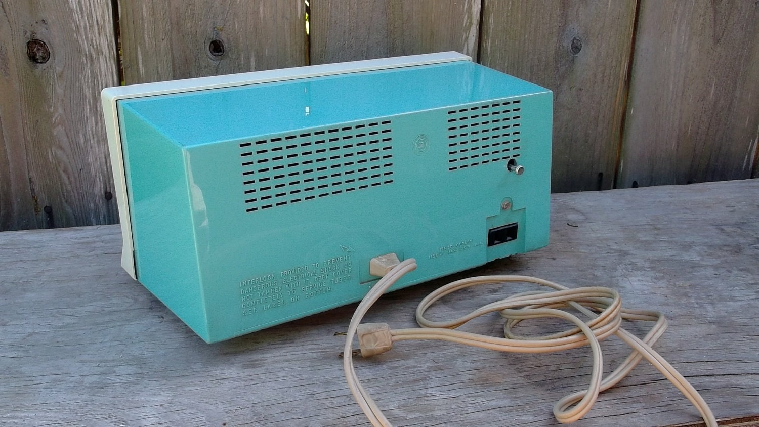 vintage 50s clock radio mid century GE turquoise radio