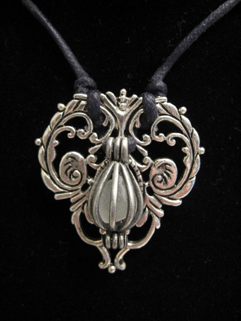 urban artifact necklace - caged frosted white beach glass, sterling silver filigree jewelry component