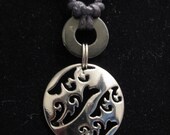 urban artifact necklace - black washer, shiny gunmetal filigree jewelry component