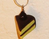 Chocolate Frosted Vanilla Cake Slice with Cocoa Candy Decorations Pendant / Necklace
