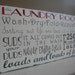 The Laundry Room Typography Word Art in Weather Worn White with Red