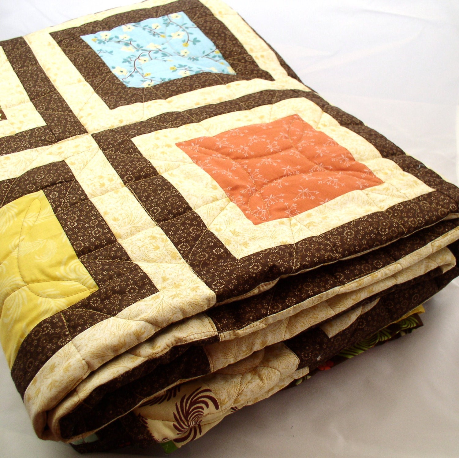 Bright and fun queen sized quilt with framed squares of color