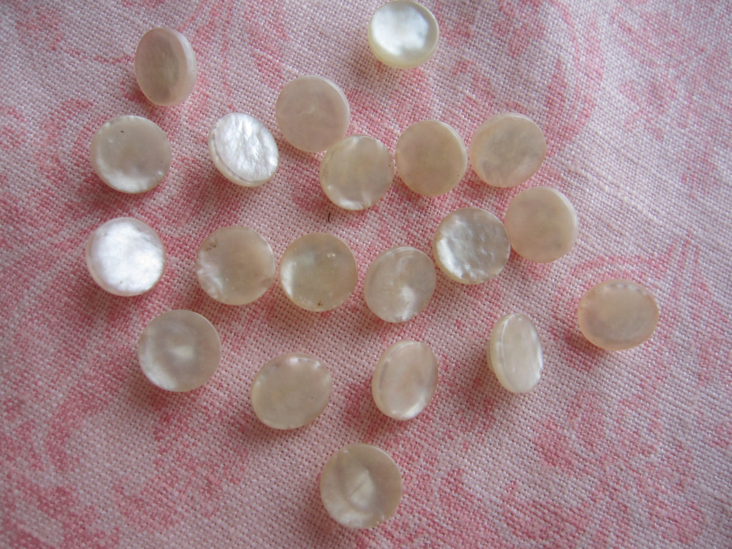 Vintage small white pearl sheen round plastic shank buttons. Wholesale lot of 20.