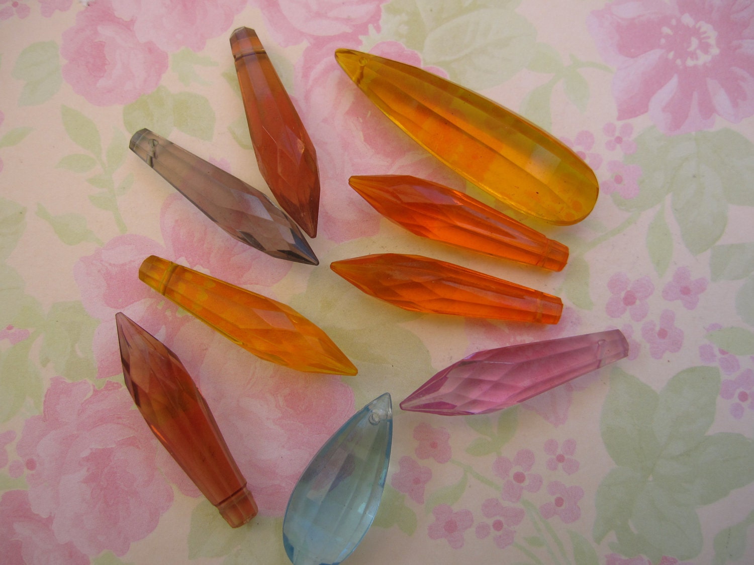 Vintage assorted size and color ornamental faceted chandelier plastic crystals. Wholesale lot set of 9.