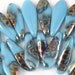 Turquoise Dagger beads with Vitrail finish