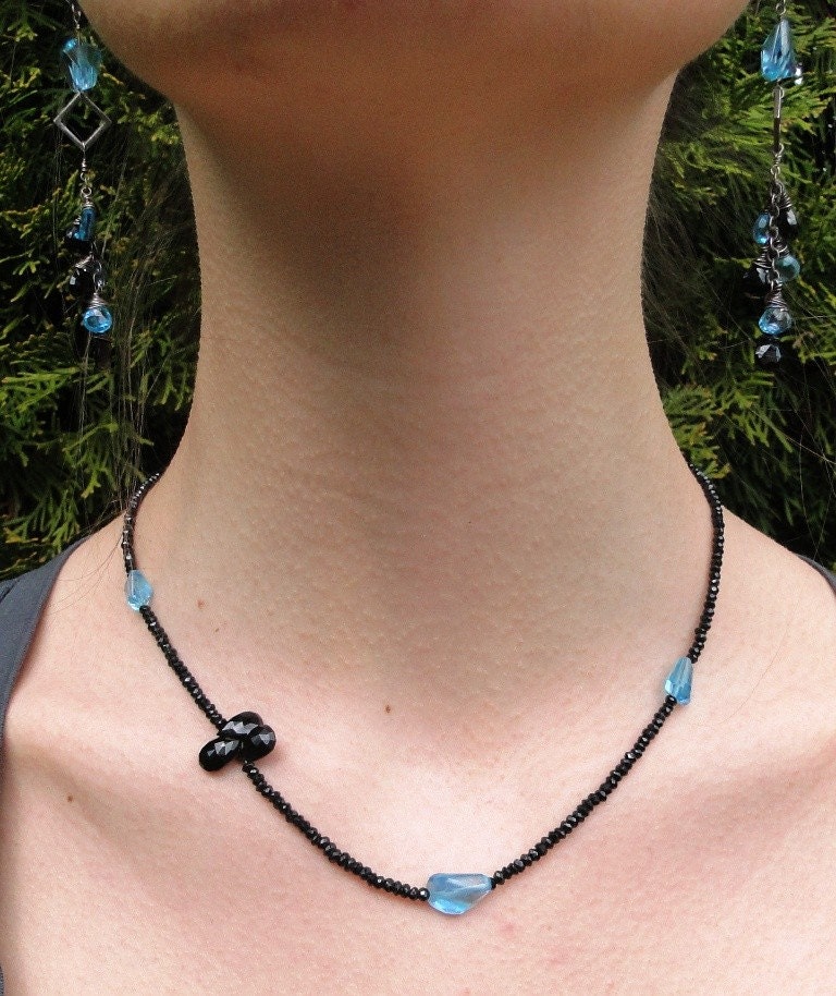 Blue Topaz and Garnet Necklace by Ocean Phoenix Designs on Etsy