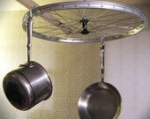 Rotating bike wheel pot rack