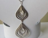 Unique Silvertone Pendant