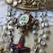 RESERVED for Shireen - sacred rose - vintage assemblage brooch with prayer card pendant and mother of pearl rosary by the french circus