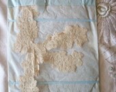 1 yd. of Breathtaking wide embroidered net lace in ivory, more avail.