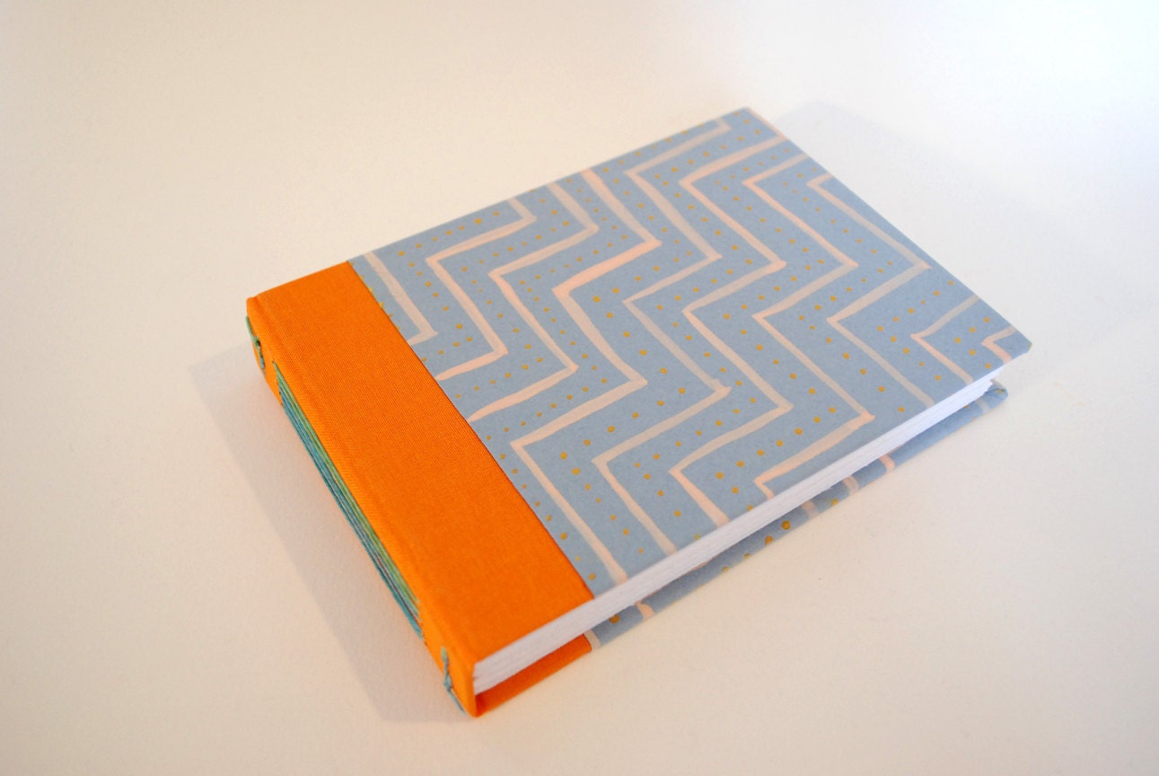 lie-flat workbook with dotted, perfect graph-making paper
