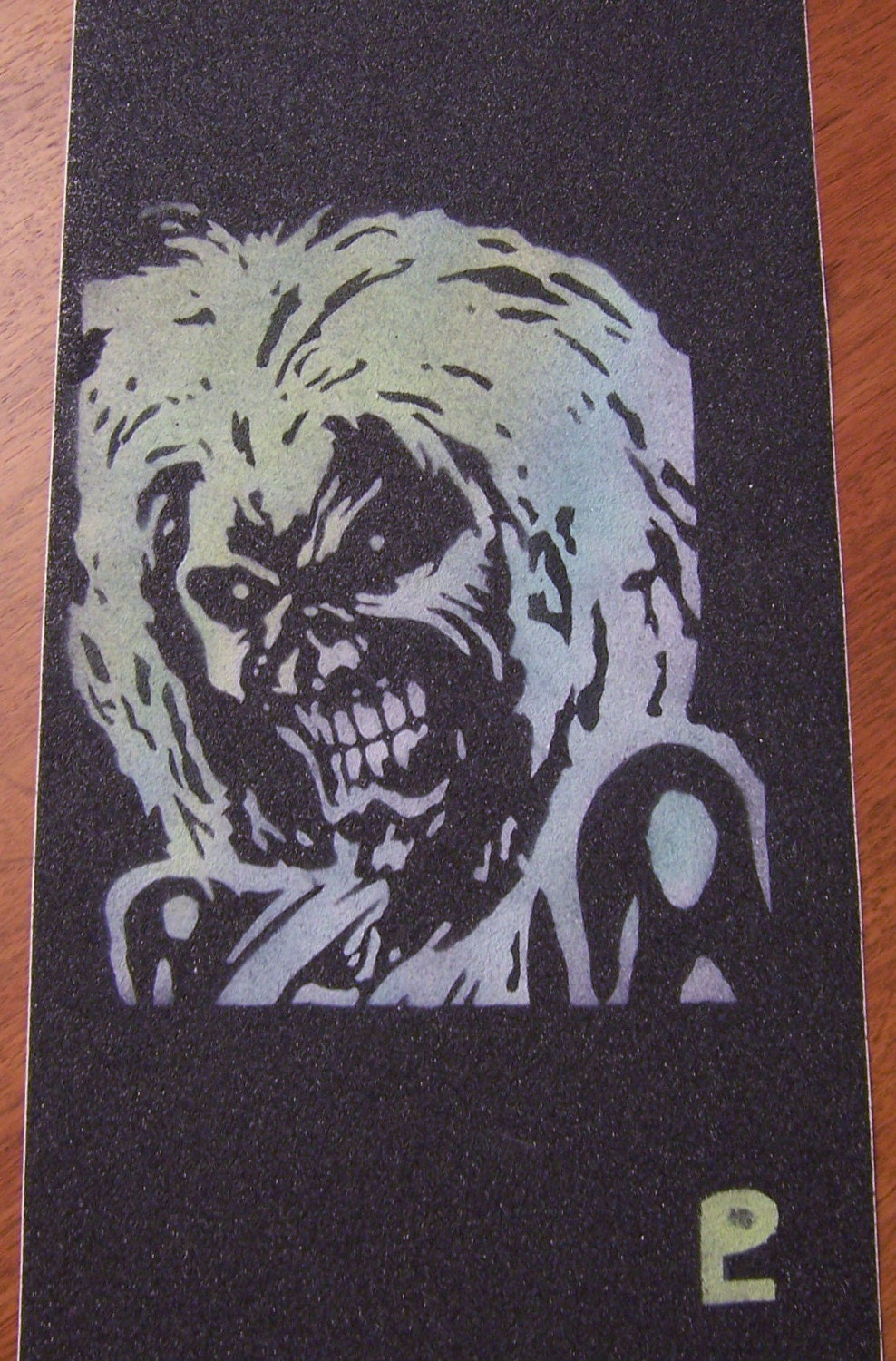 Iron Maiden stencil on griptape sheet by CustomGriptapeArtVT