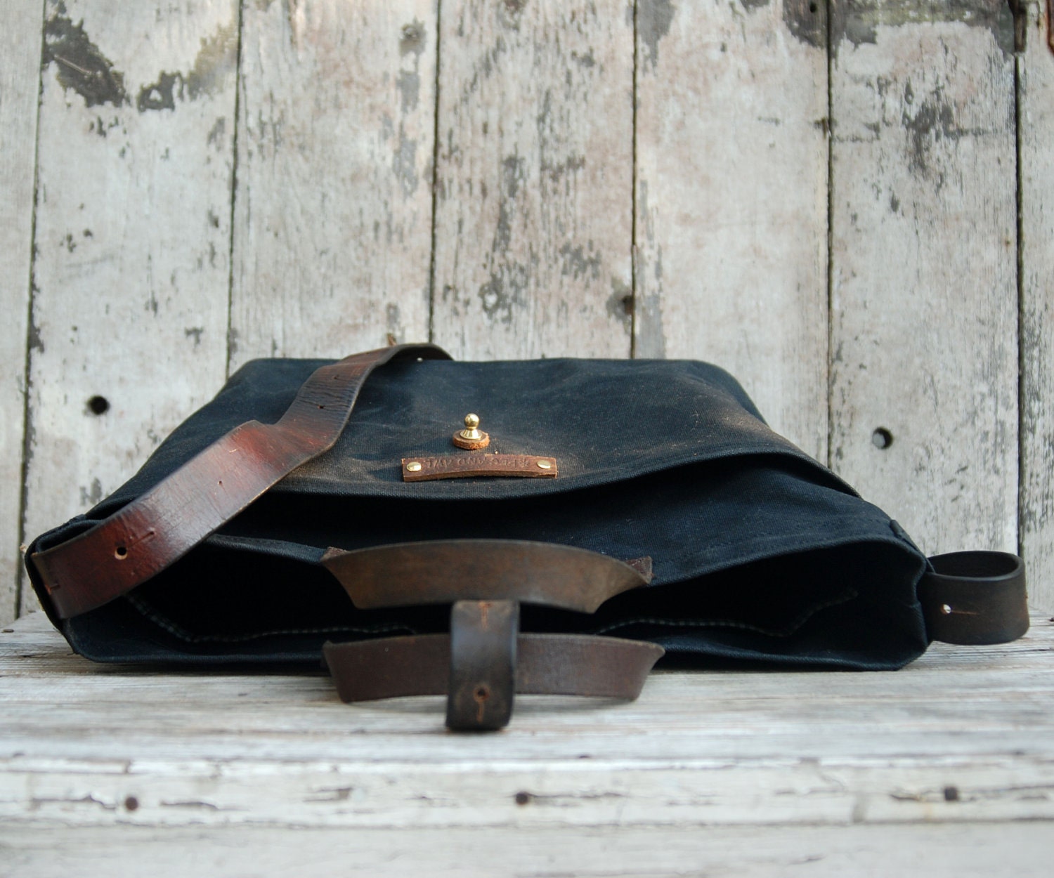 Waxed Canvas Tote: Coal, antique leather and fabric detail.