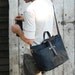 Waxed Canvas Tote: Coal, antique leather and fabric detail.