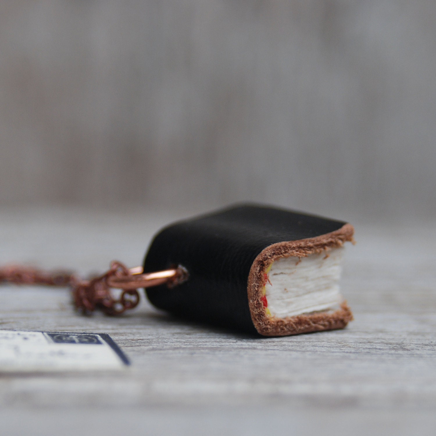 Book Necklace: Not Complicated, black leather with brown edge, small.