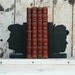 Bookends: Female Criminal Minds, reclaimed oak, black milk paint.