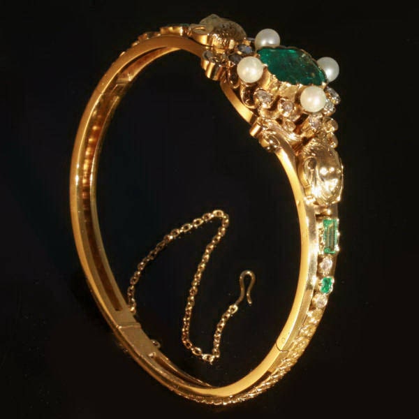 Victorian gold diamond bangle with magnificent emerald in box by bapst & falize (ca.1870)