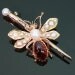Stylized bee brooch red garnet pearls, Victorian era