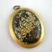 Gold and black pendant crackle reversable with red original design polymer clay and brass