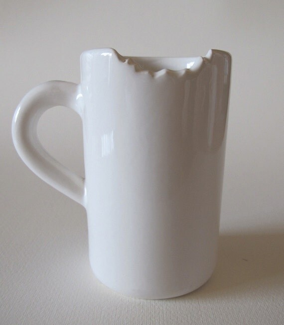 BITTEN COFFEE MUG