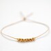 Wish bracelet. Gold facetted nuggets- Butterscotch Irish linen cord thread - delictate bracelet