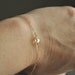 Tiny Star Bracelet - golden swarovski crystal charm gold filled chain - adenandclaire